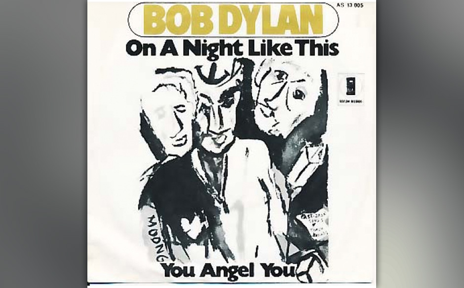 „On A Night Like This“ gemahnt an eine verschneite Hütte oder eben die „Basement Tapes“-Tage in upstate New York,...