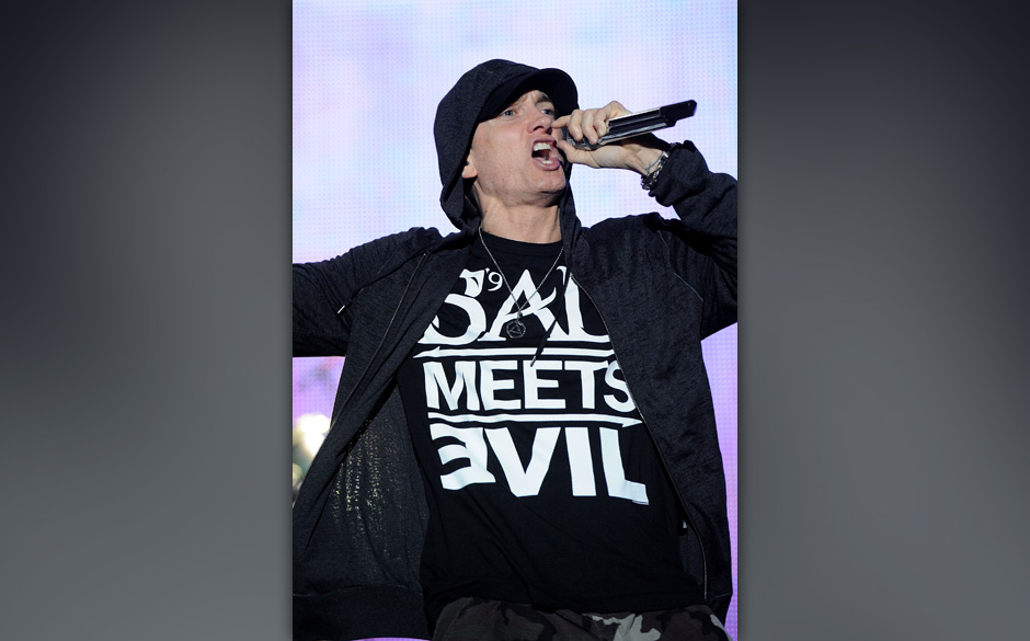 MANCHESTER, TN - JUNE 11:  Eminem performs on stage during Bonnaroo 2011 at What Stage on June 11, 2011 in Manchester, Ten...