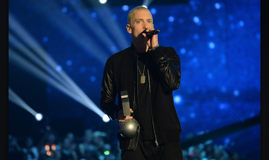 AMSTERDAM, NETHERLANDS - NOVEMBER 10:  Eminem accepts the Best Hip Hop award onstage during the MTV EMA's 2013 at the Ziggo D