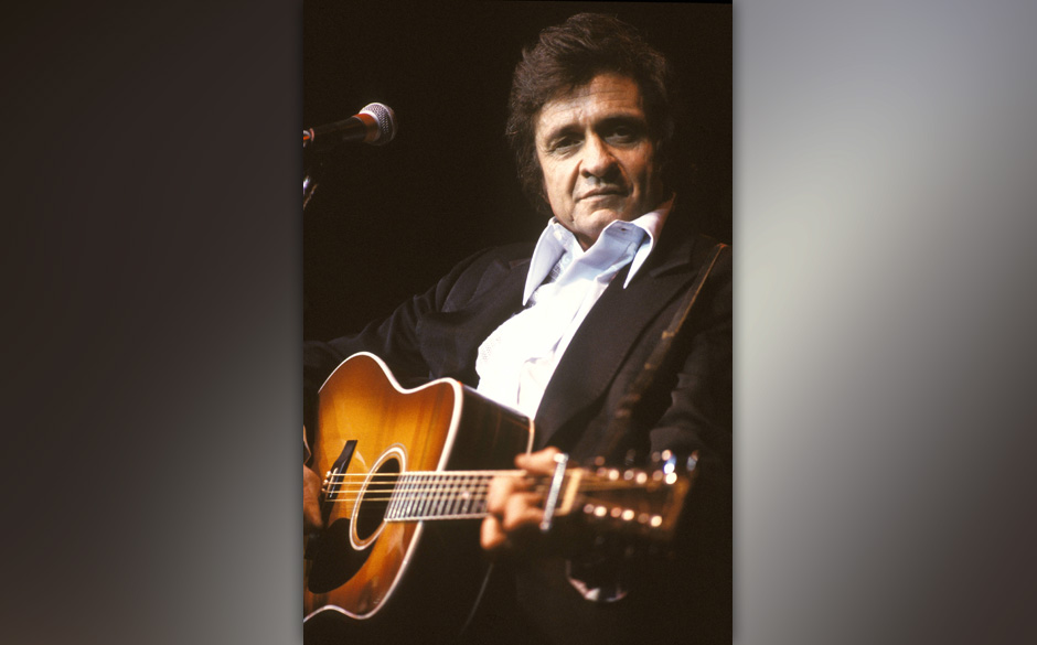 UNITED KINGDOM - MARCH 01:  Photo of Johnny CASH; Johnny Cash performing on stage at the Festival of Country Music David R...