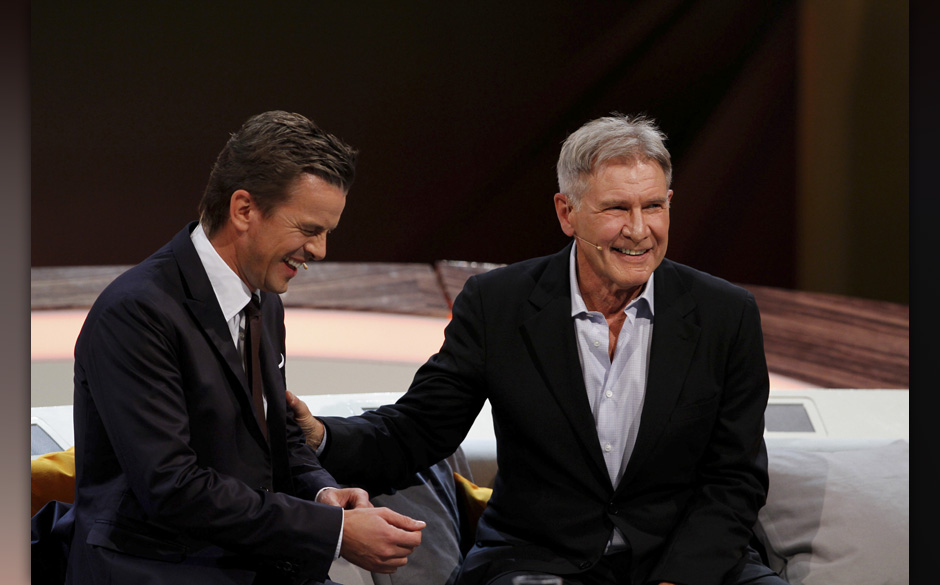 Markus Lanz (hier mit Harrison Ford). Beim Dschungelcamp sind Zuschauer aufgefordert, jemanden rauszuwählen. Wir sehen da...