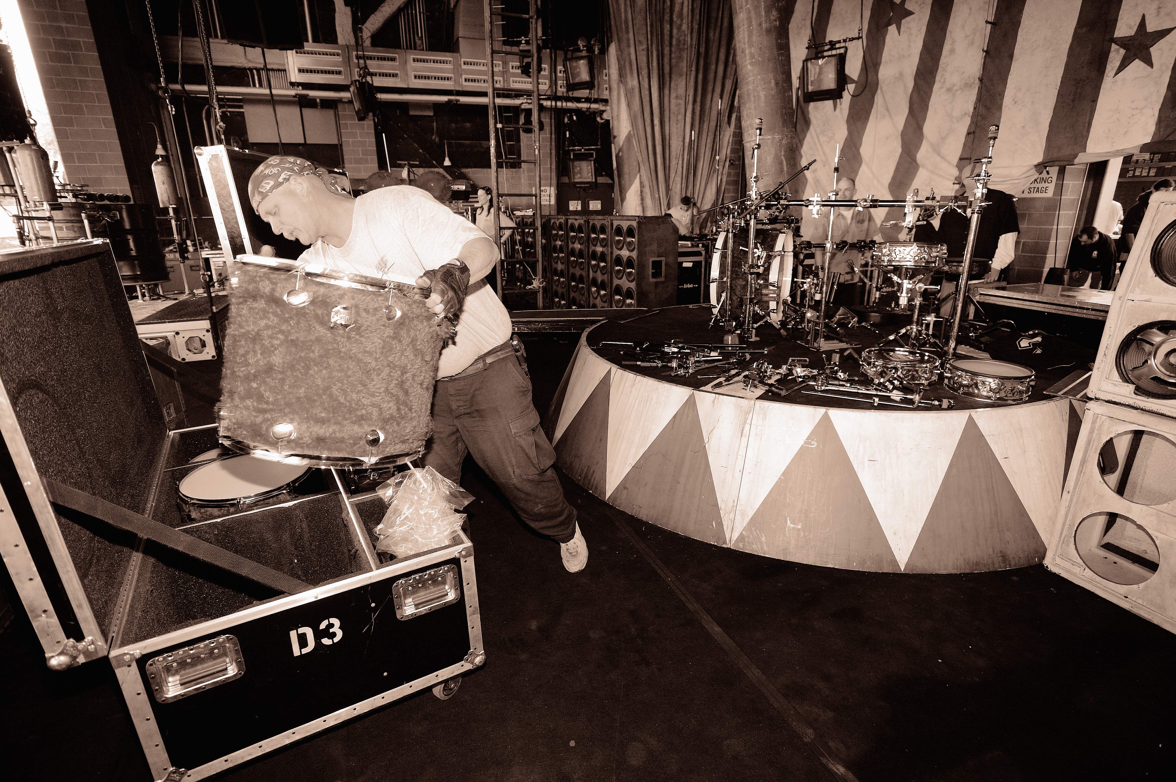 UNITED STATES - MARCH 20:  Photo of STAGE and ROADIES and BACKSTAGE and MOTLEY CRUE; roadies setting up the stage before a...