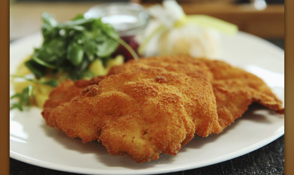 Wiener schnitzel, the popular breadcrumb coated cutlet of veal, a traditional Germanic dish, served in Munich, Bavaria, Germa
