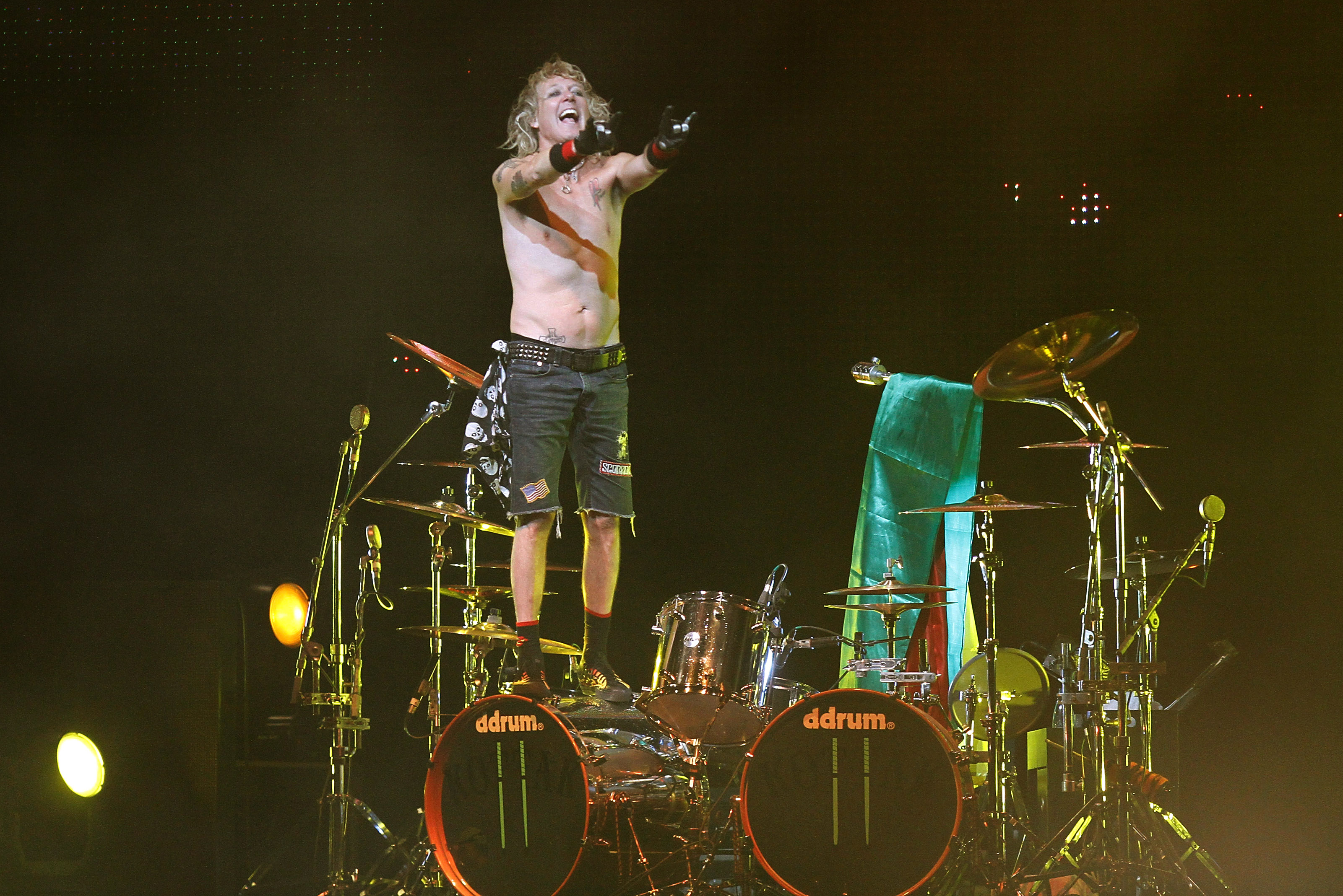 FILE- In this Thursday, Sept. 16, 2010, file photo, James Kottak, drummer of the German rock band Scorpions, gestures duri...