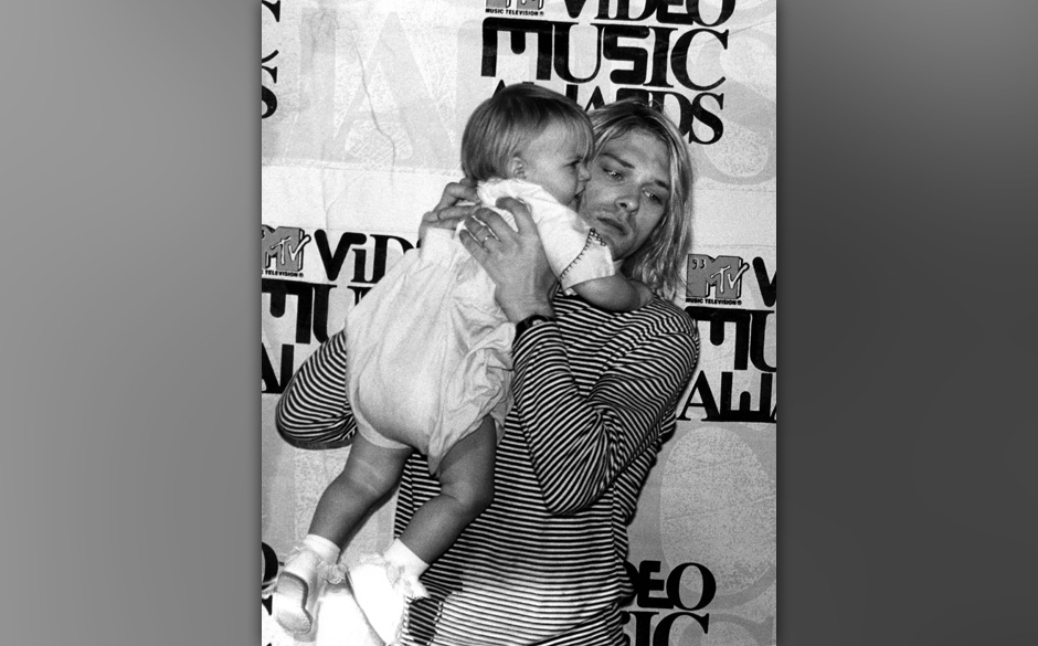 UNITED KINGDOM - JANUARY 01:  MTV AWARDS EUROPE  Photo of NIRVANA, with his daughter Frances Bean  (Photo by Donna Santisi...