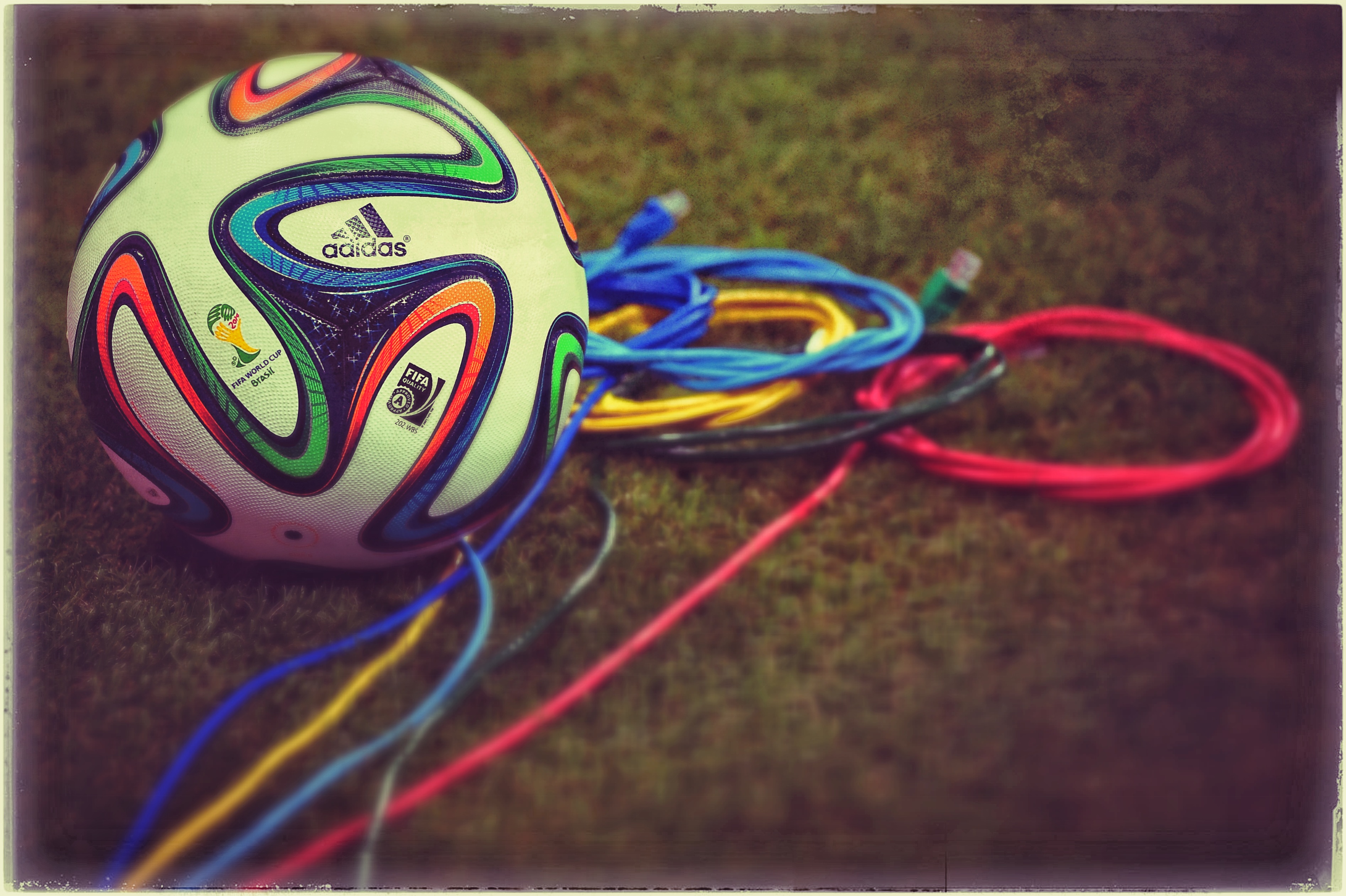 SALVADOR, BRAZIL - JUNE 12: (EDITORS NOTE: THIS IMAGES HAS BEEN CREATED WITH THE USE OF DIGITAL FILTERS)  A Brazuca ball i...