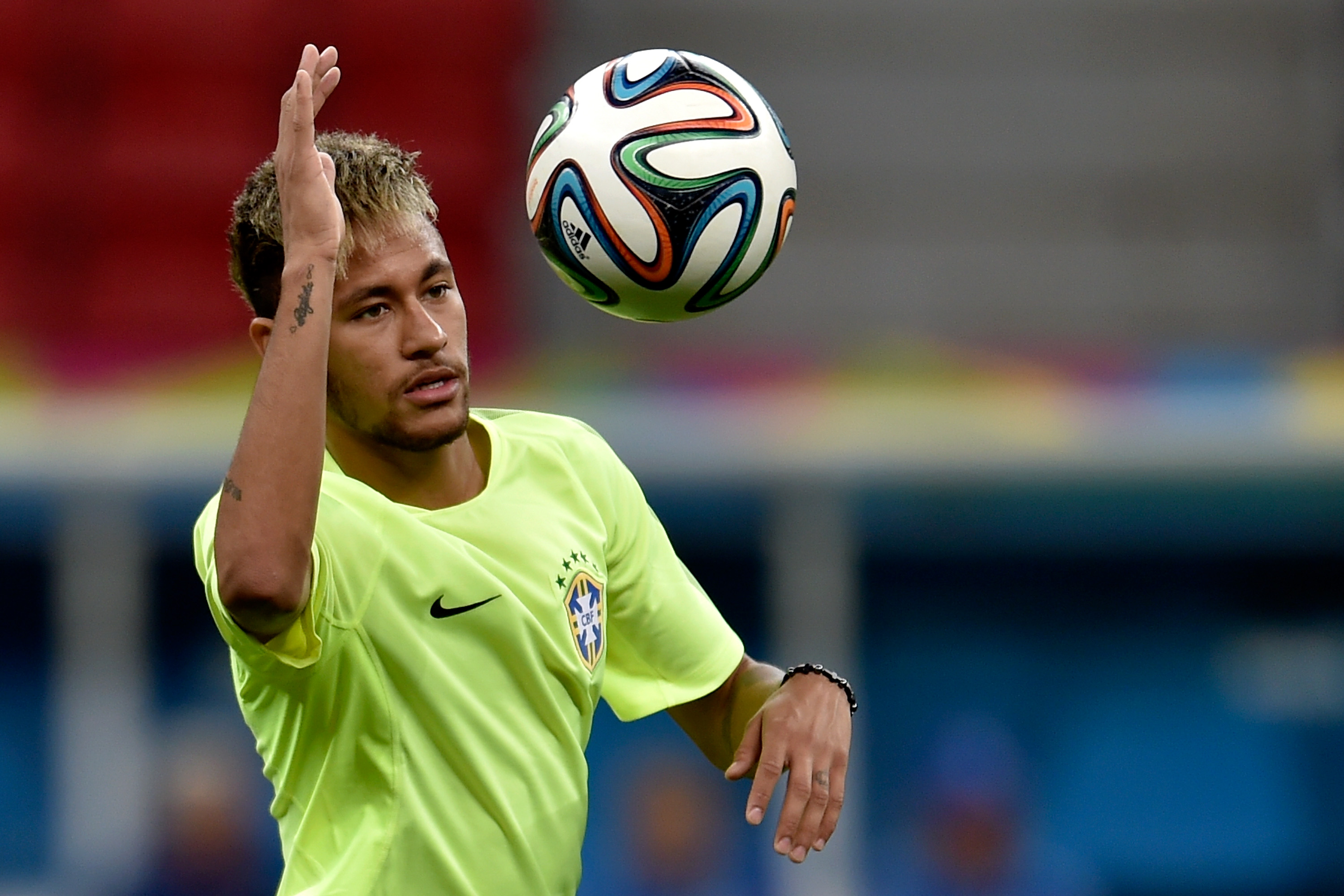 BRASILIA, BRAZIL - JUNE 22:  Neymar of Brazil in action during a training session at Mane Garrincha Stadium on June 22, 20...