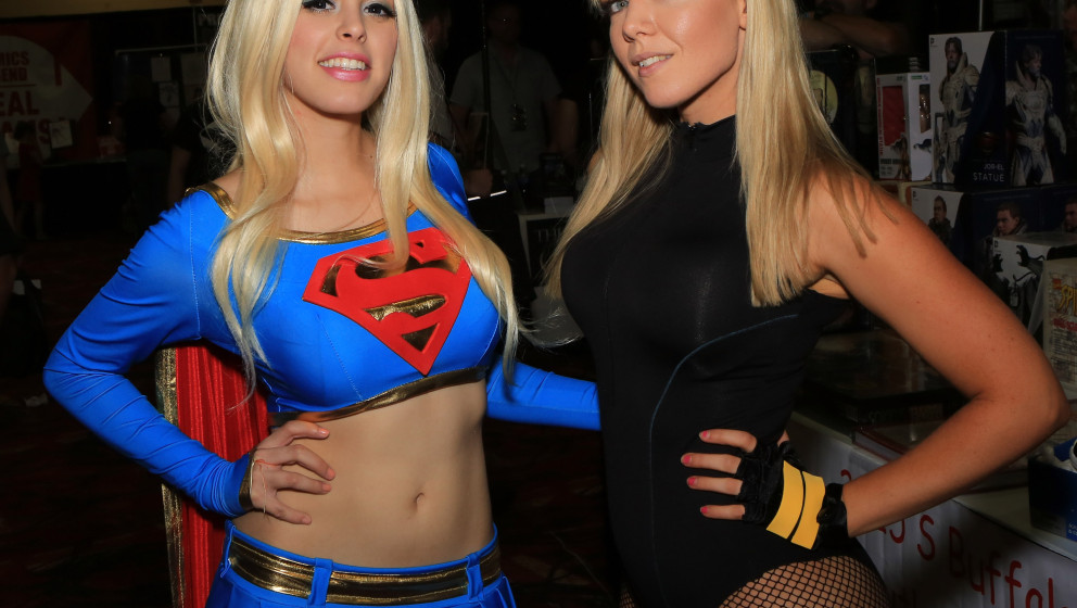 LAS VEGAS, NV - JUNE 15:  Cosplay model Nadya Anton (L), dressed as the character Supergirl from the 'Superman' comic book fr