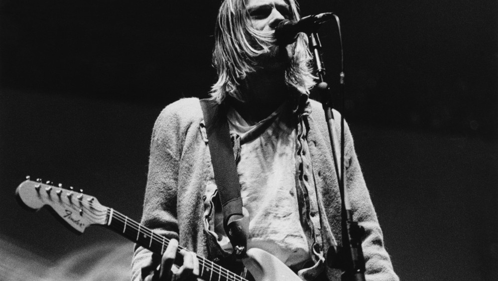 Singer-songwriter and guitarist Kurt Cobain (1967 - 1994) performing with American grunge band Nirvana at Palasport, Modena, 