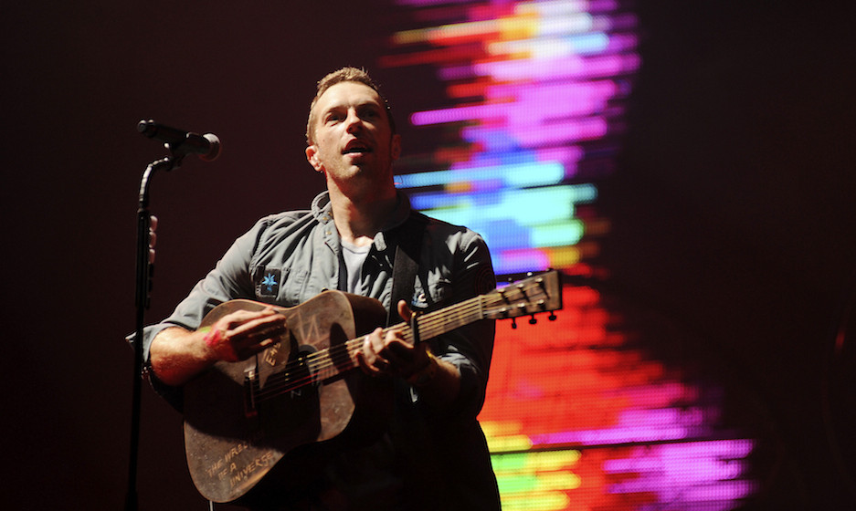 GLASTONBURY, UNITED KINGDOM - JUNE 25: Chris Martin of Coldplay headlines the Pyramid stage on the third day of Glastonbury F