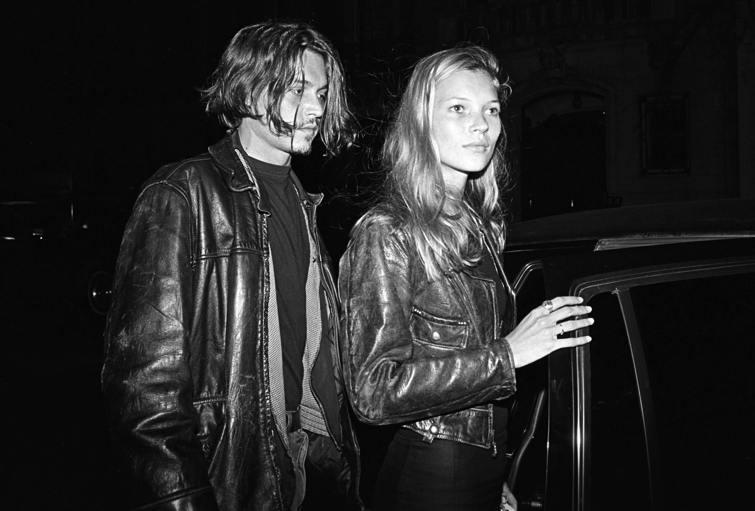NEW YORK - 1994:  British supermodel Kate Moss (R) and American actor Johnny Depp leaving  a party for John Waters' film "...