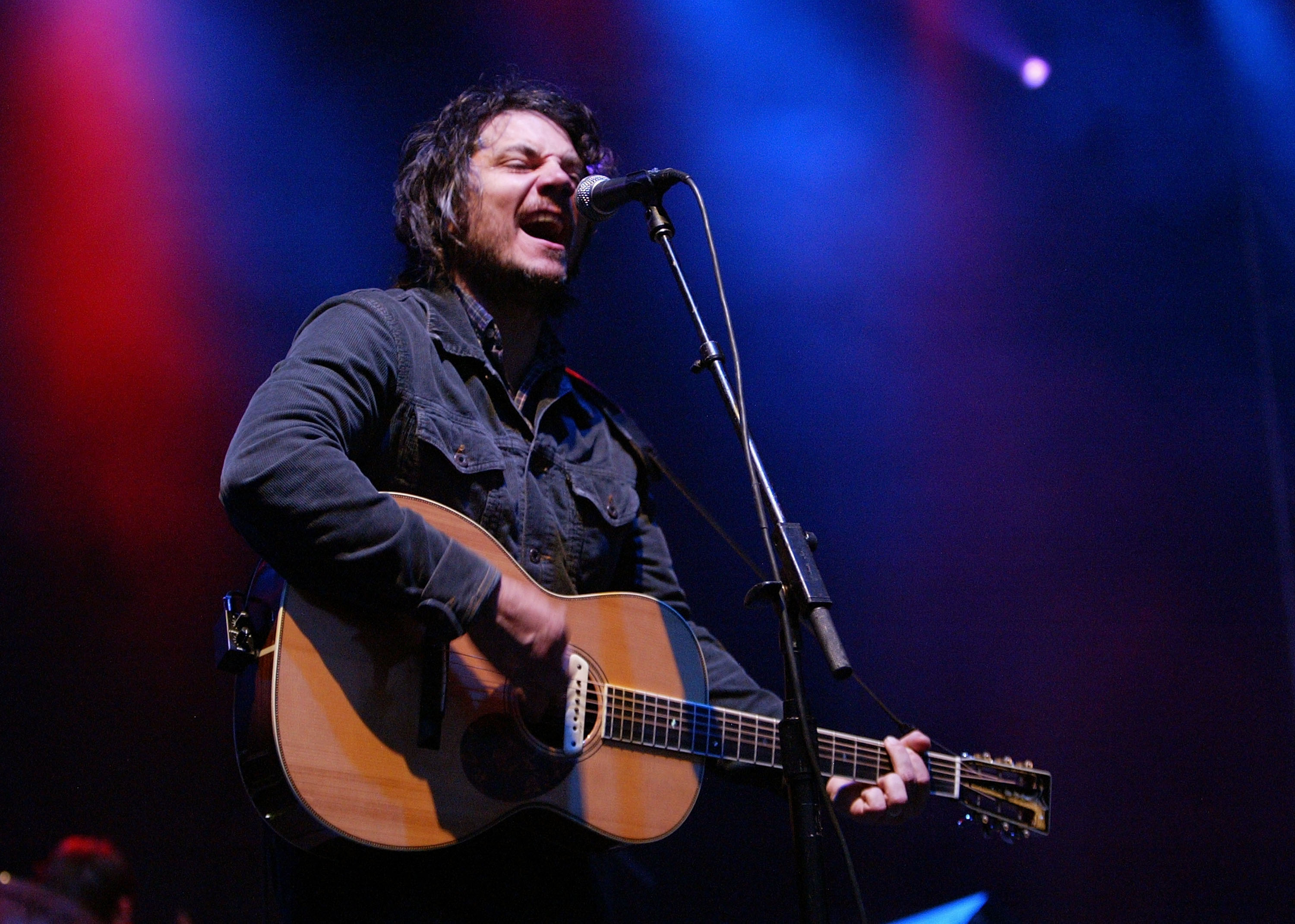 Musician Jeff Tweedy of Wilco performs in concert at KeySpan Park on July 13, 2009 in Brooklyn, New York. (Photo by Mike L...