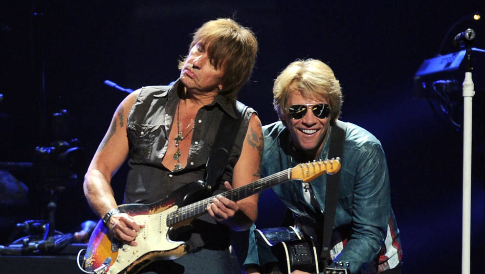 LAS VEGAS, NV - SEPTEMBER 21:  Guitarist Richie Sambora (L) and singer Jon Bon Jovi of Bon Jovi perform onstage during the 20