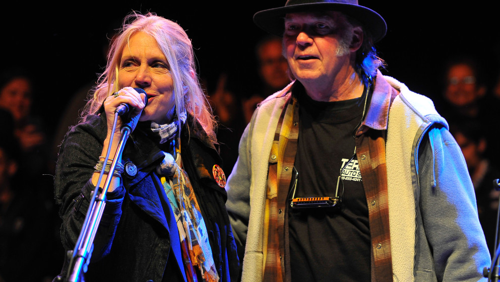 MOUNTAIN VIEW, CA - OCTOBER 27: Pegi Young and Neil Young (L-R) perform on Day 2 of the 27th Annual Bridge School Benefit con