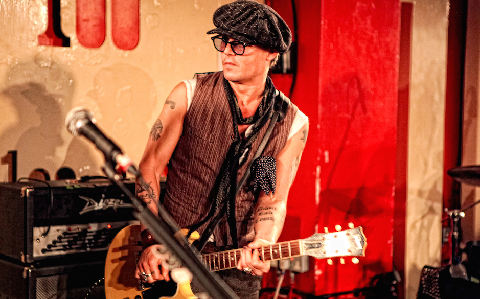 LONDON, UNITED KINGDOM - JUNE 26: Johnny Depp performs on stage with Alice Cooper at an intimate club gig and played guita...