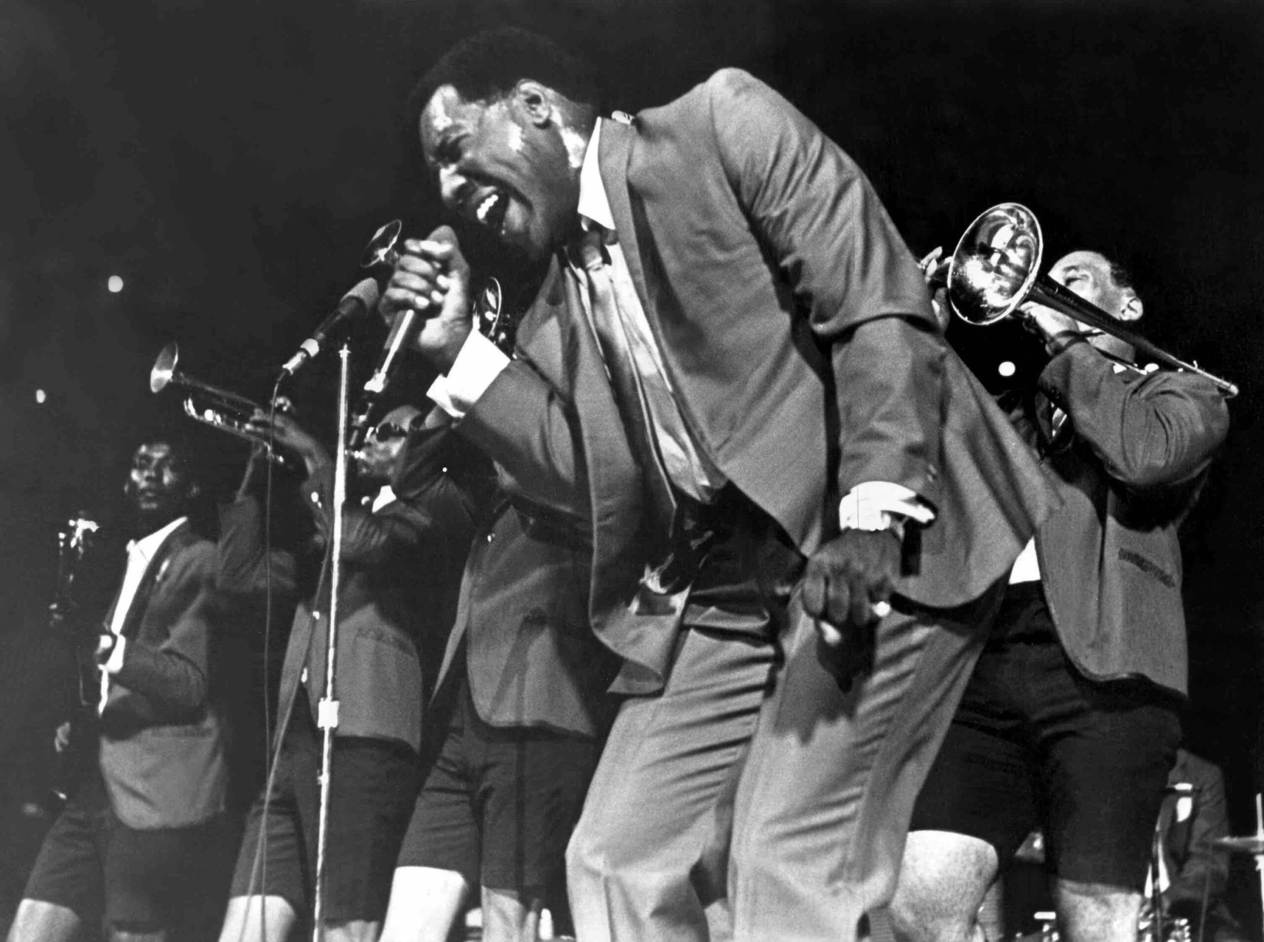1967: Soul singer Otis Redding passionately sings with his horn section behind him as he performs onstage in 1967. (Photo ...