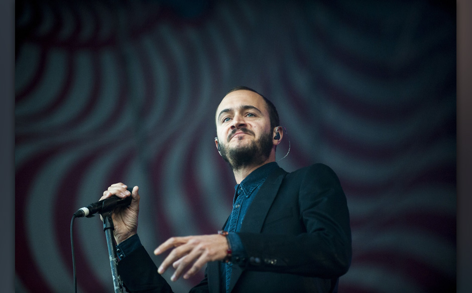 Singer Tom Smith performs from the British alternative rock band, Editors, performs at the 21st Sziget (Island) Festival o...