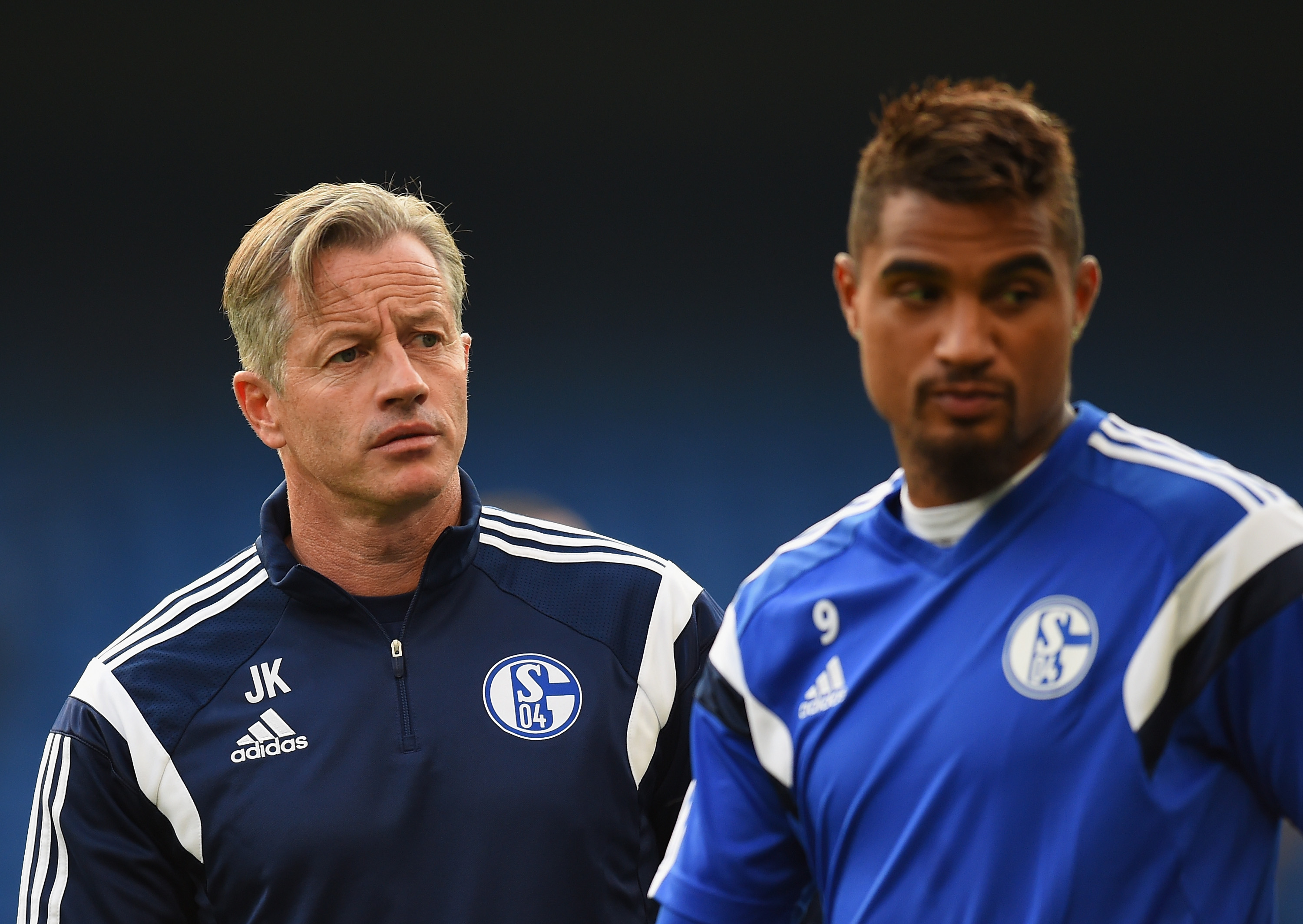 LONDON, ENGLAND - SEPTEMBER 16:  Schalke coach Jens Keller talks to Kevin-Prince Boateng during a FC Schalke 04 training s...