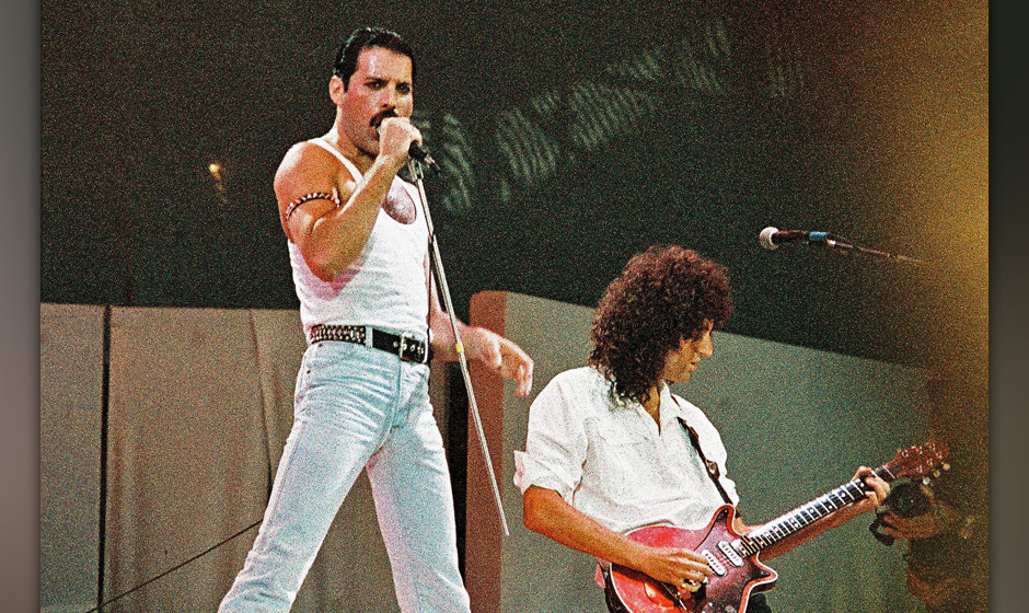 LONDON, UNITED KINGDOM - JULY 13: Freddie Mercury of Queen performs on stage at Live Aid on July 13th, 1985 in Wembley Stadiu