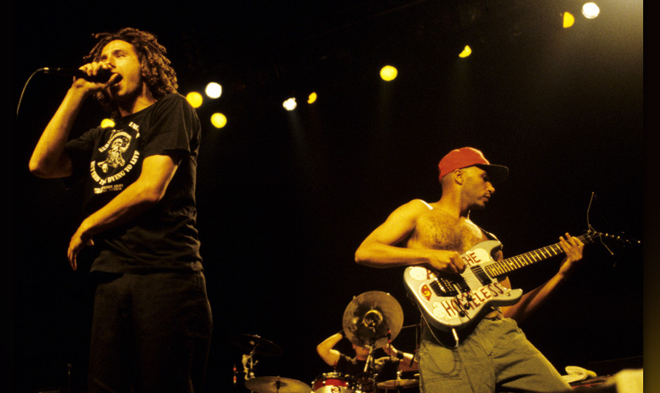 SAN JOSE, CA - SEPTEMBER 3: Zack de la Rocha (L) and Tom Morello of Rage Against the Machine perform in support of the bands'