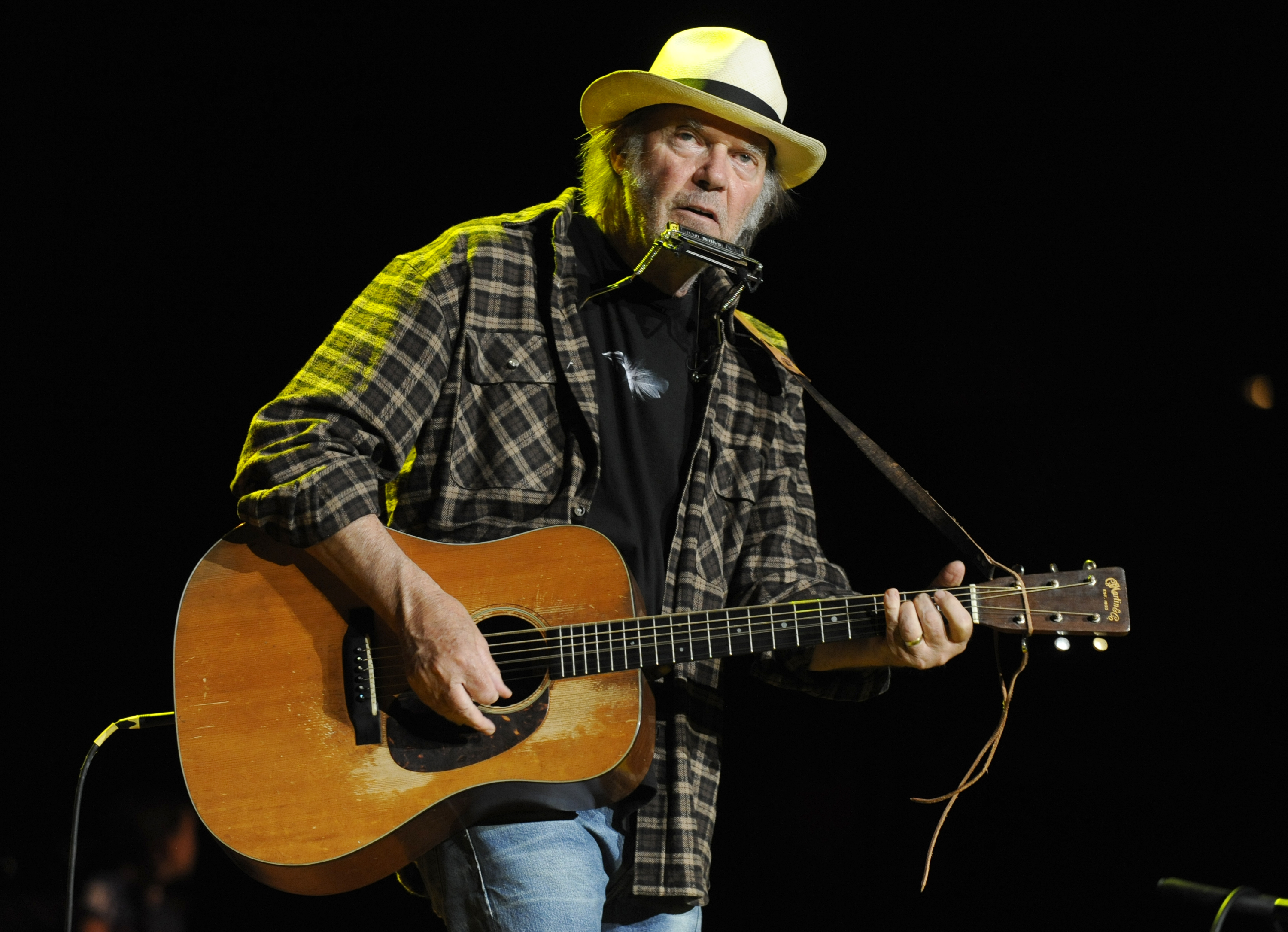 MOUNTAIN VIEW, CA - OCTOBER 23: Neil Young performs as part of the 25th Annual Bridge School Benefit at Shoreline Amphithe...