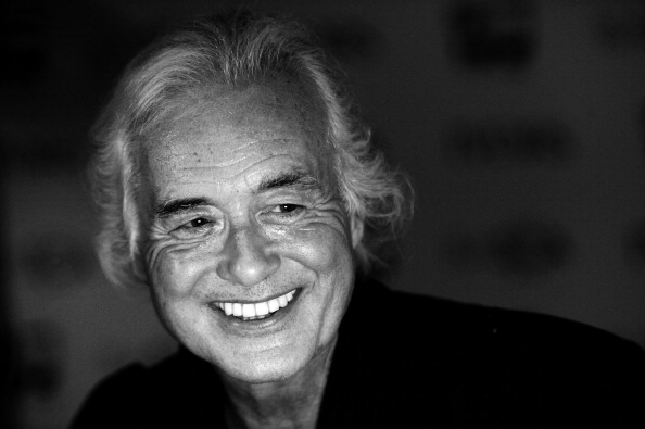 LONDON, ENGLAND - MAY 22: (EDITORS NOTE: Image has been converted to black and white.)  Jimmy Page poses in the winners ro...
