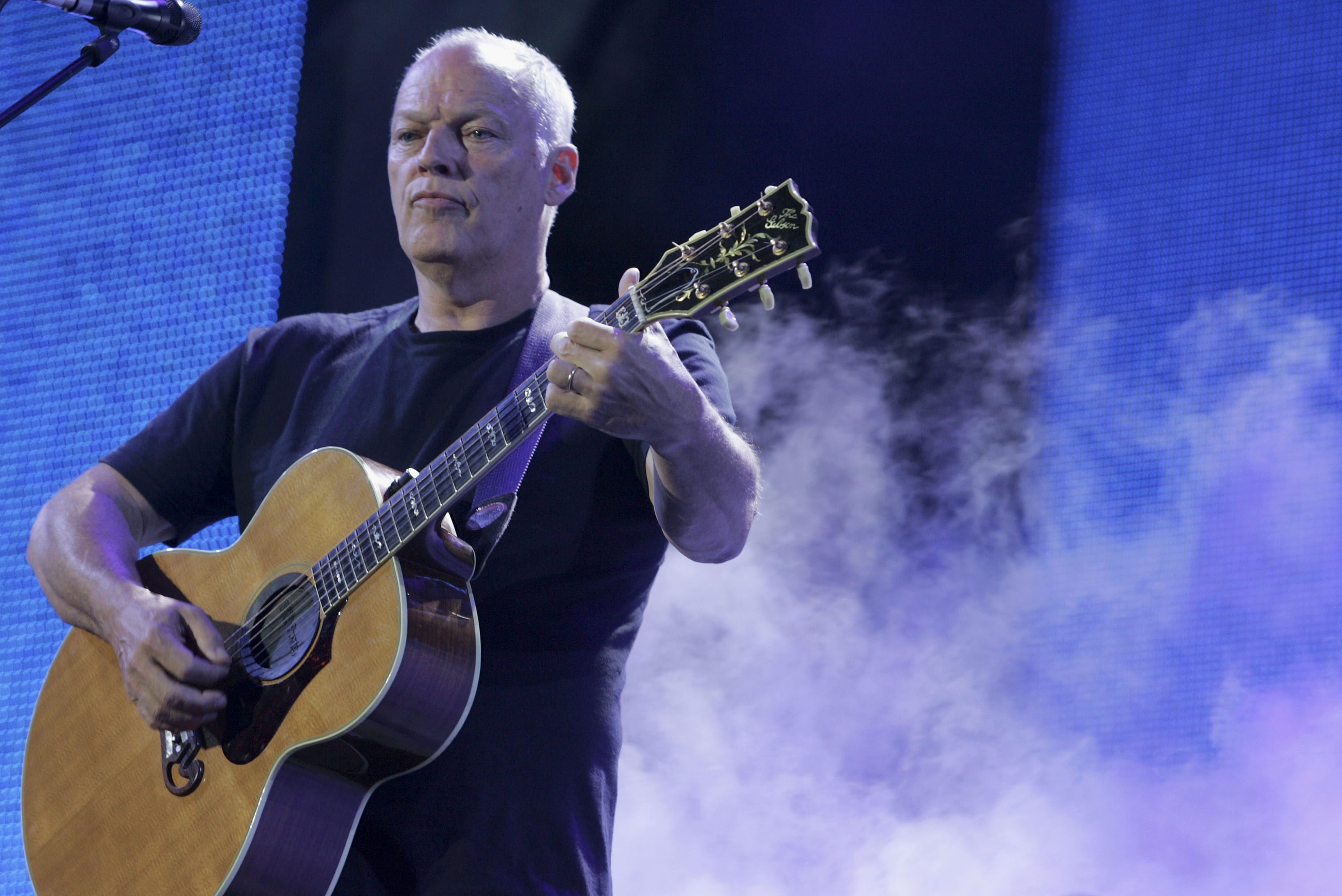 LONDON - JULY 02:  Dave Gilmour of Pink Floyd performs on stage at "Live 8 London" in Hyde Park on July 2, 2005 in London,...