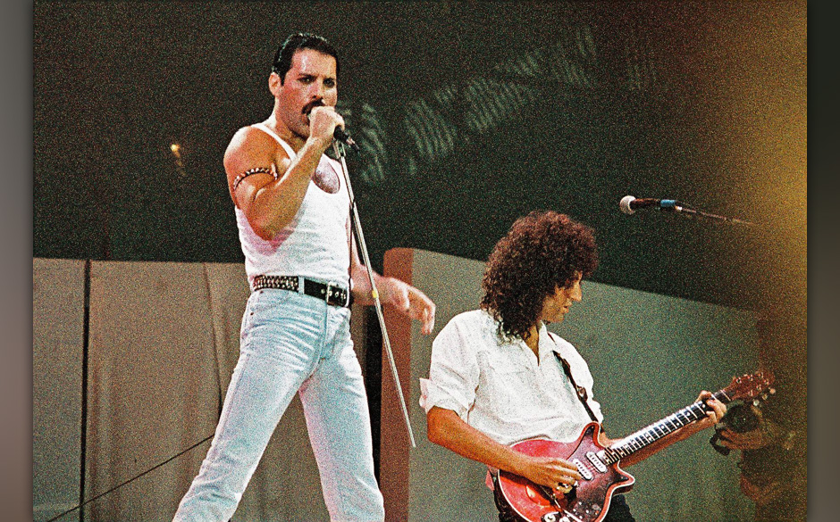 LONDON, UNITED KINGDOM - JULY 13: Freddie Mercury of Queen performs on stage at Live Aid on July 13th, 1985 in Wembley Sta...