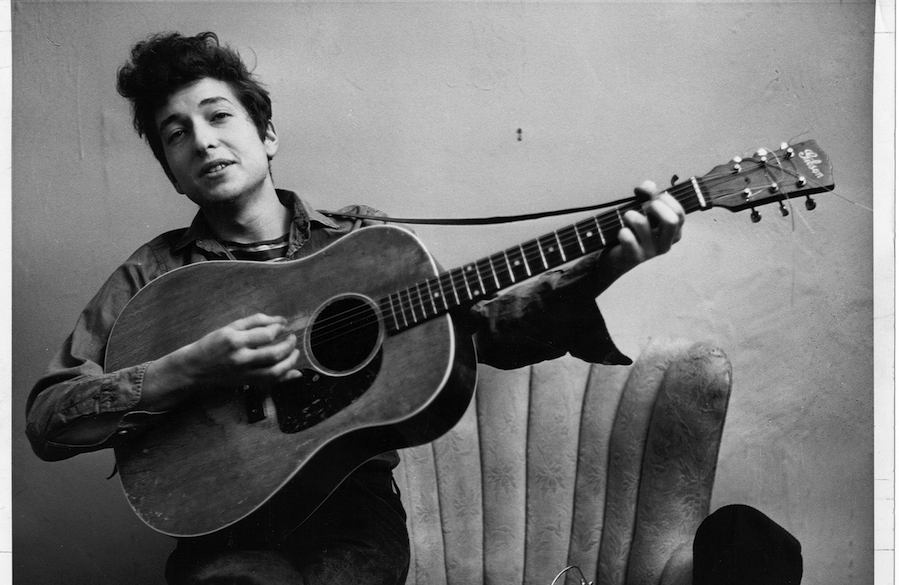 NEW YORK - SEPTEMBER 1961: Bob Dylan poses for a portraitwith his Gibson Acoustic guitar in September 1961 in New York Cit...