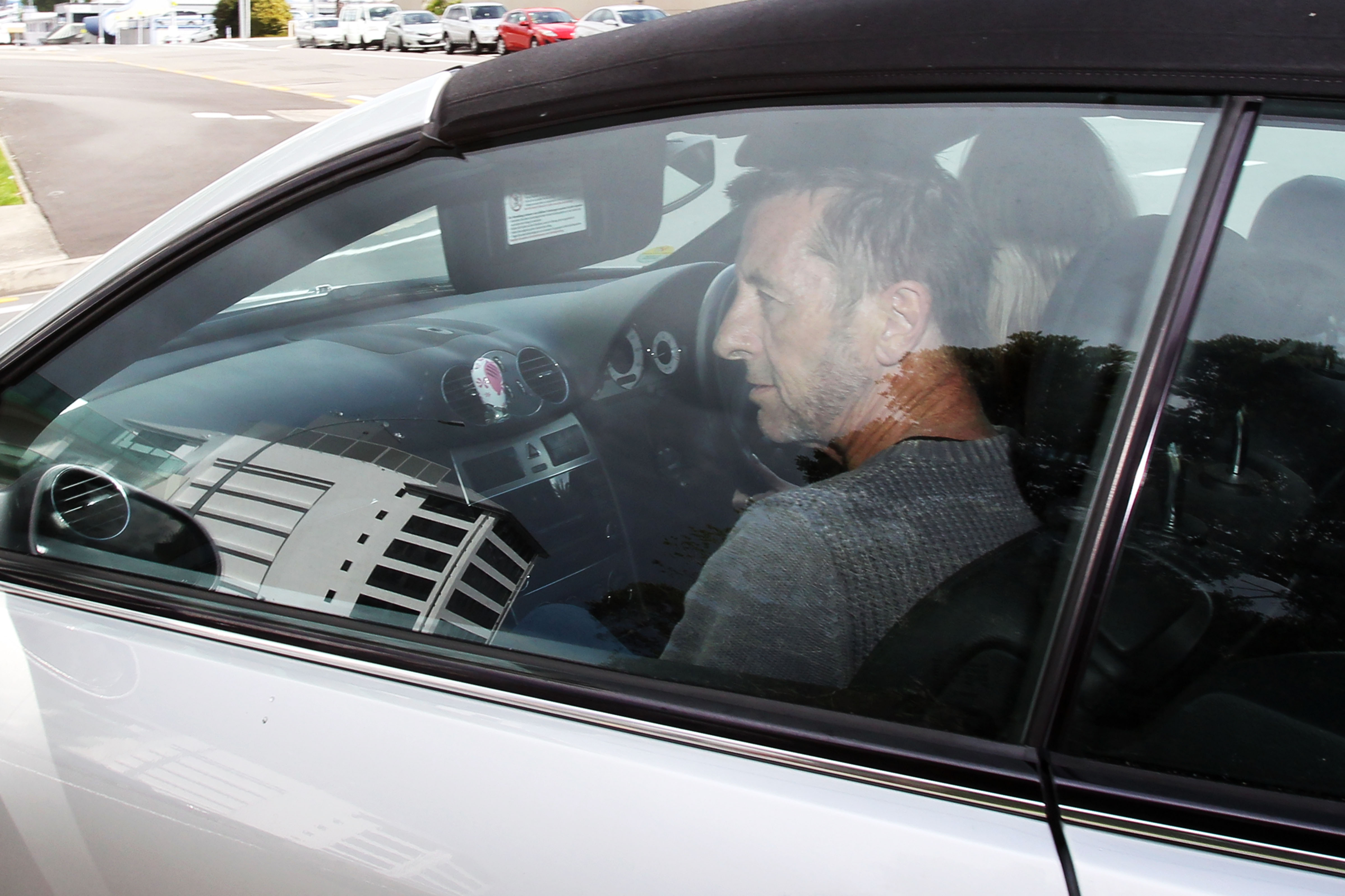 TAURANGA, NEW ZEALAND - NOVEMBER 06:  AC/DC drummer Phil Rudd leaves Tauranga District Court  after being charged with att...