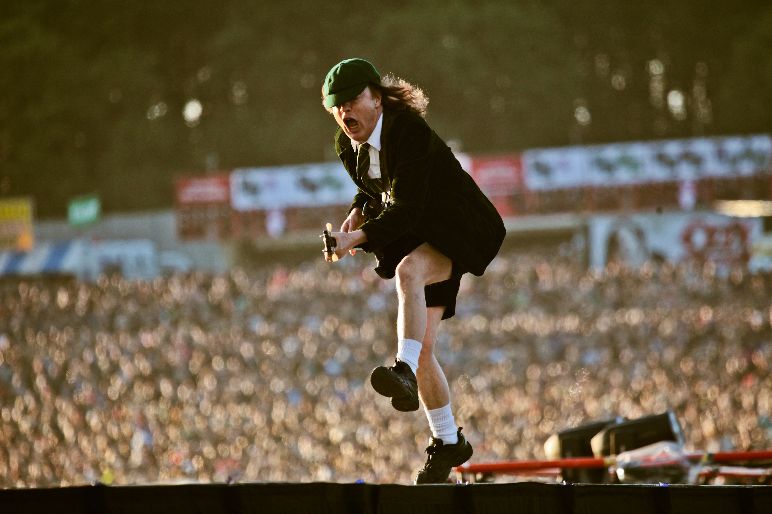 DONINGTON, UK - JUNE 11: A view from the stage showing the audience as Angus Young of AC/DC performs on stage at Download ...