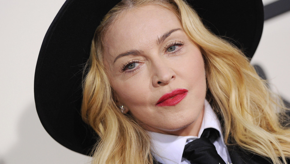 LOS ANGELES, CA - JANUARY 26:  Singer Madonna arrives at the 56th GRAMMY Awards at Staples Center on January 26, 2014 in Los 