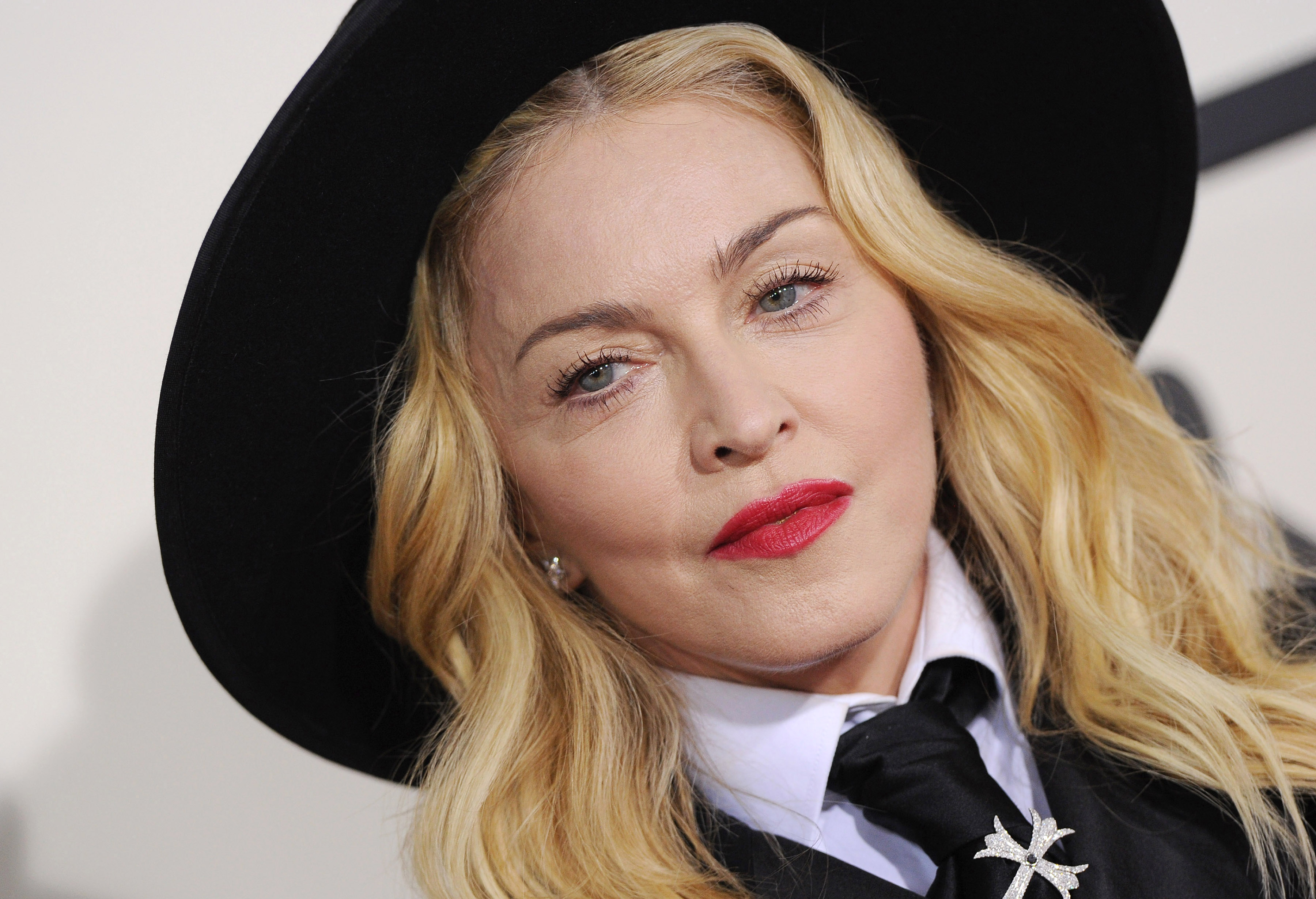 LOS ANGELES, CA - JANUARY 26:  Singer Madonna arrives at the 56th GRAMMY Awards at Staples Center on January 26, 2014 in L...