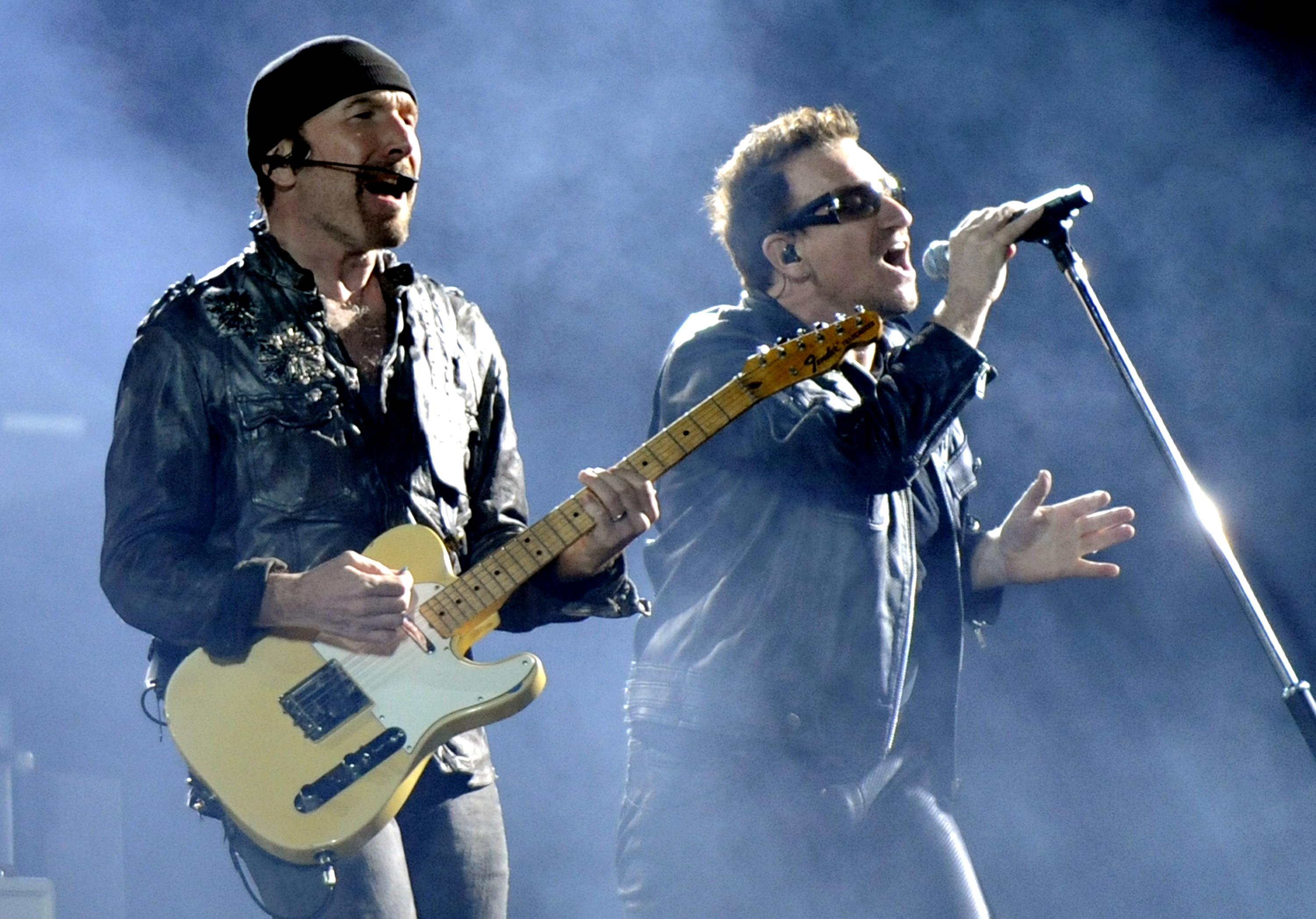 OAKLAND, CA - JUNE 7: The Edge (L) and Bono of U2 perform in support of the bands' U2 360 Tour at Overstock.com Coliseum o...
