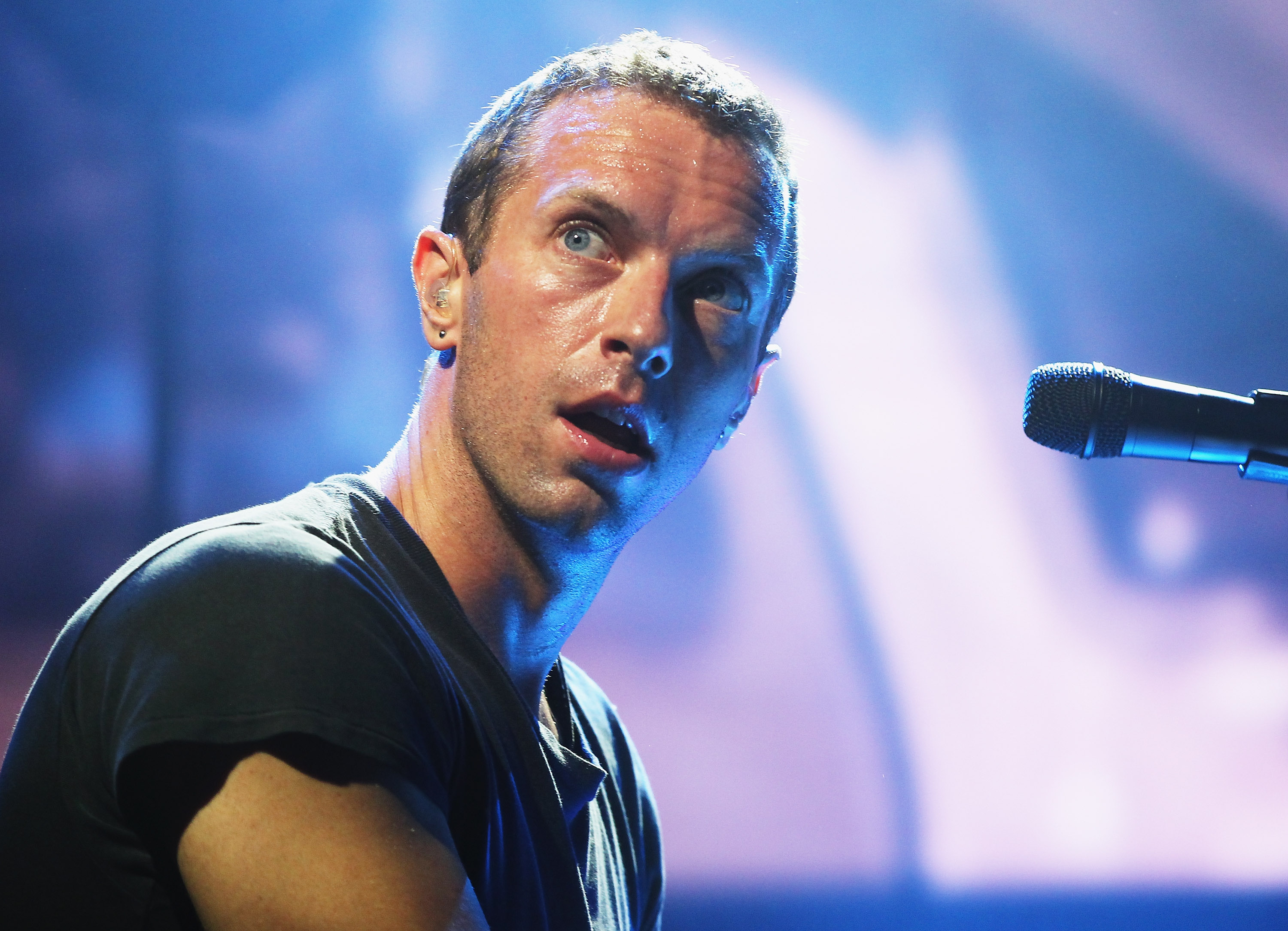 SYDNEY, AUSTRALIA - JUNE 19:  Chris Martin of Coldplay performs live for fans at Enmore Theatre on June 19, 2014 in Sydney...