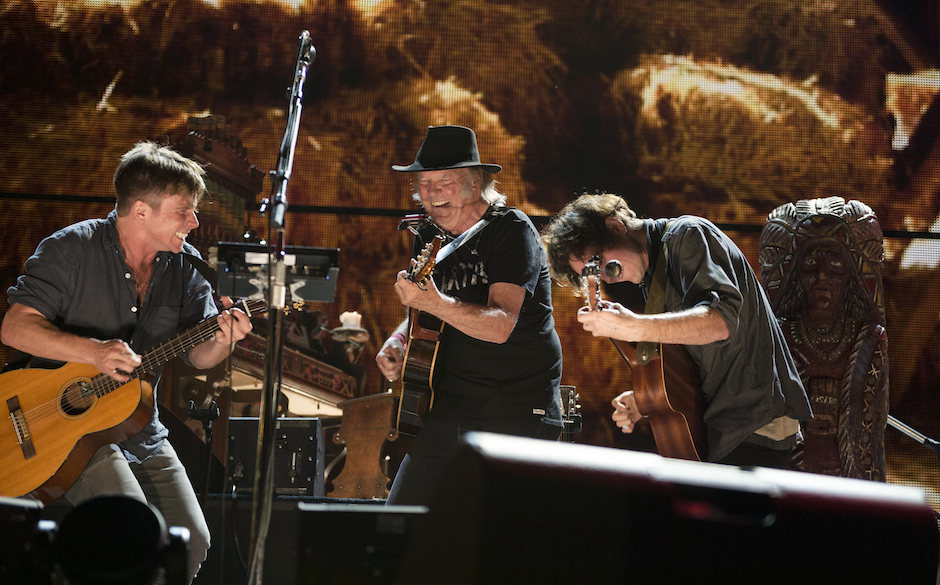 (L to R) Lukas Nelson, Neil Young and Micah Nelson performing at the 2014 Farm Aid concert on September 13, 2014 at Walnut...