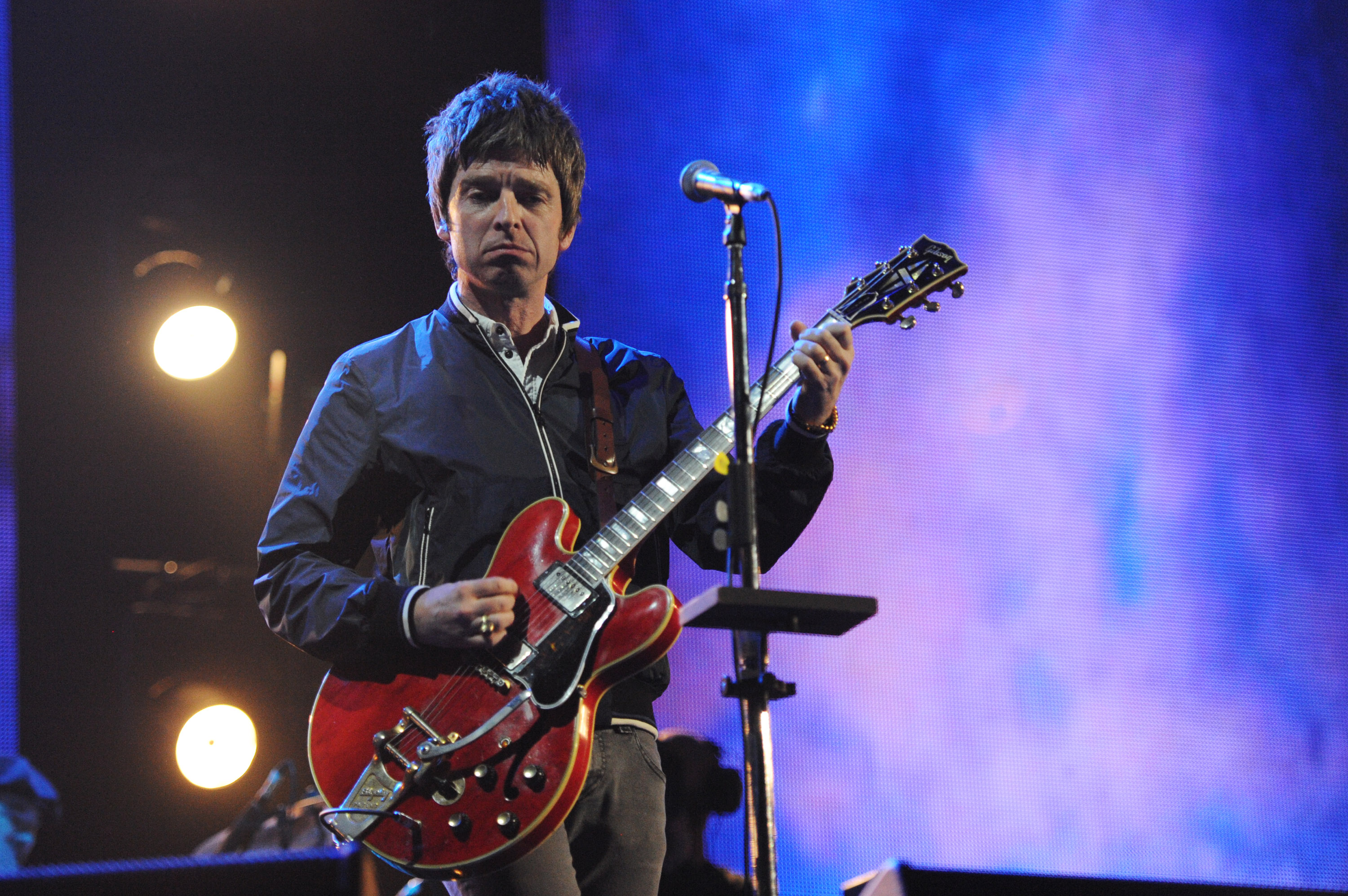 LONDON, ENGLAND - MARCH 06:  Noel Gallagher performs onstage for 'Give It Up For Comic Relief' at Wembley Arena on March 6...