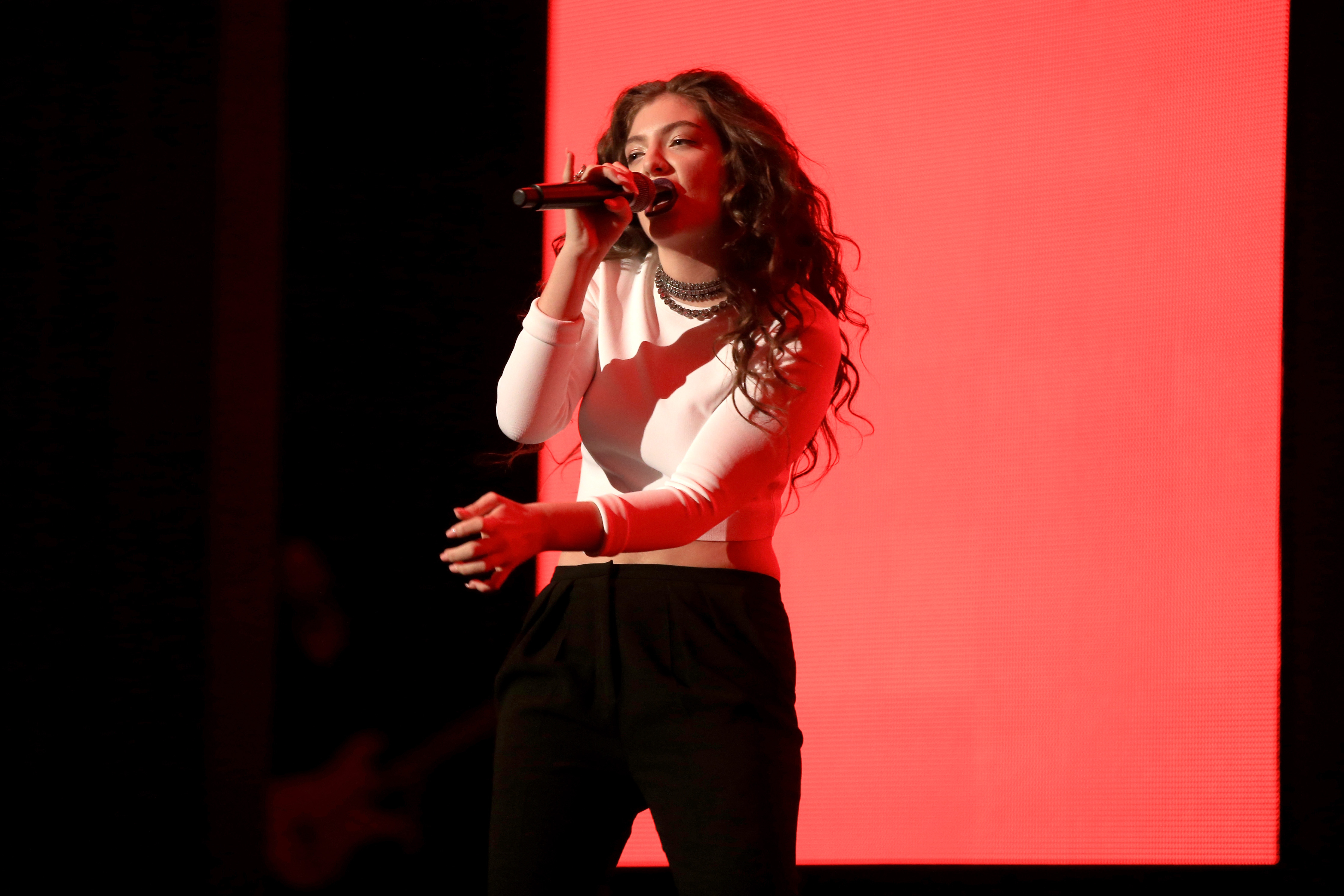 LOS ANGELES, CA - NOVEMBER 23:  Recording artist Lorde performs onstage at the 2014 American Music Awards at Nokia Theatre...