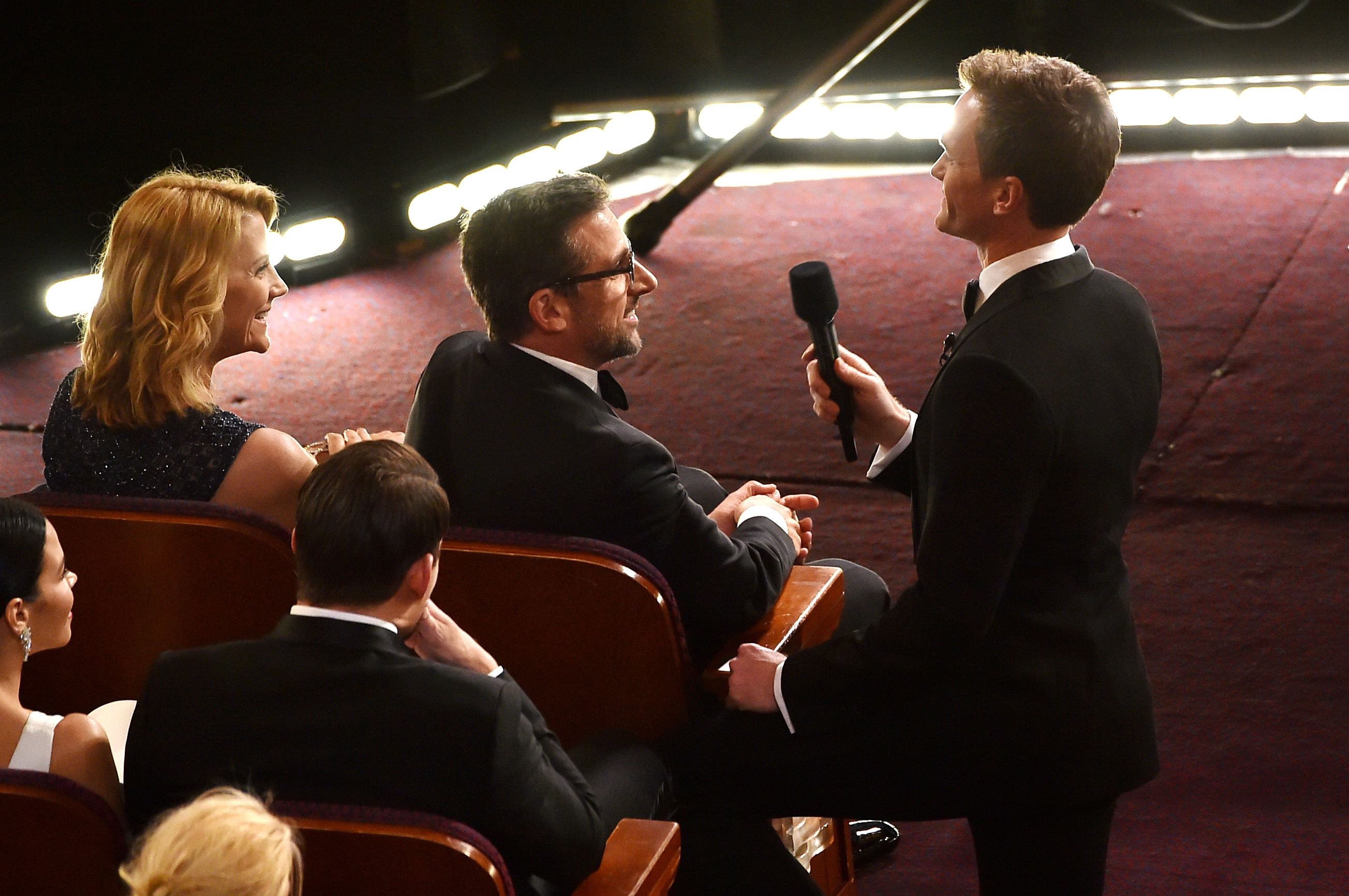 HOLLYWOOD, CA - FEBRUARY 22:  Host Neil Patrick Harris (R) talks with actor Steve Carell during the 87th Annual Academy Aw...
