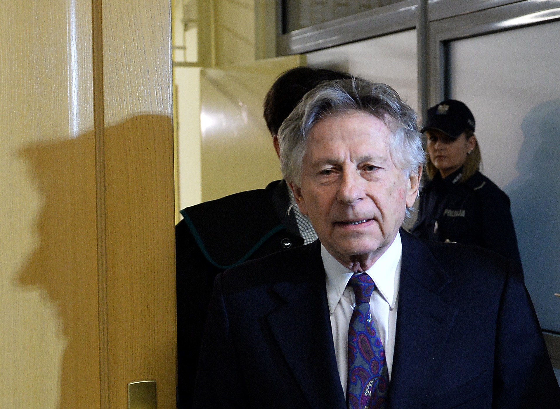 French-Polish film director Roman Polanski is pictured as he arrives for a hearing at the regional court in Krakow on Febr...