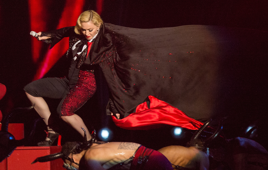 LONDON, ENGLAND - FEBRUARY 25:  Madonna falls as she performs on stage for the BRIT Awards 2015 at The O2 Arena on Februar...