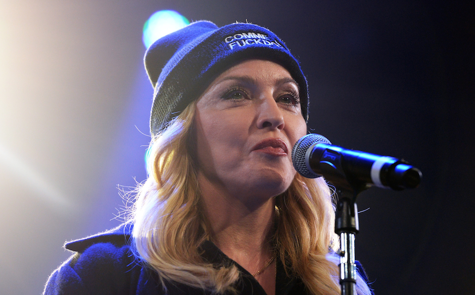 Madonna speaks onstage at the Amnesty International Concert presented by the CBGB Festival at Barclays Center on February ...