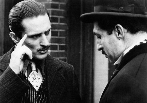 American actor Robert De Niro (left) and Italian actor Leopoldo Trieste (right) in a scene from the movie The Godfather, P...