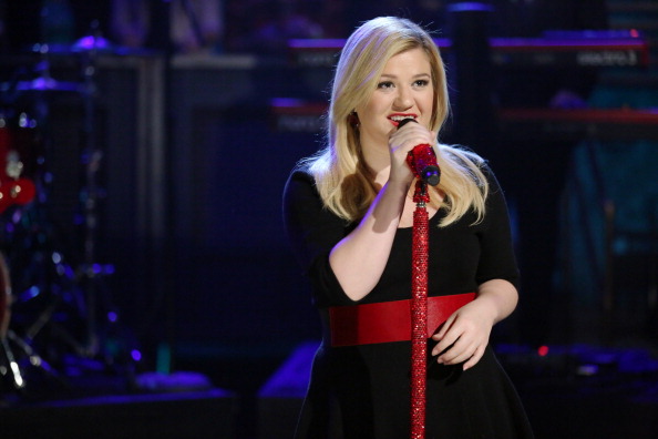 LATE NIGHT WITH JIMMY FALLON -- Episode 937 -- Pictured: Music guest Kelly Clarkson performs "Don't Rush" on Tuesday, Nove...