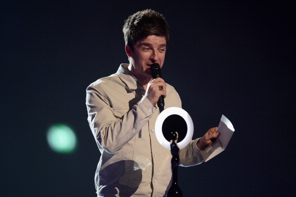 LONDON, ENGLAND - FEBRUARY 19:  Noel Gallagher presents the British Male Solo Artist award at The BRIT Awards 2014 at 02 A...
