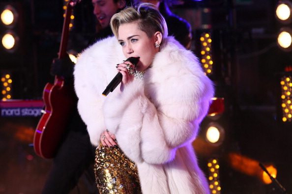 NEW YORK, NY - DECEMBER 31:  Miley Cyrus peforms on stage during The New Year's Eve 2014 Celebration in Times Square on De...