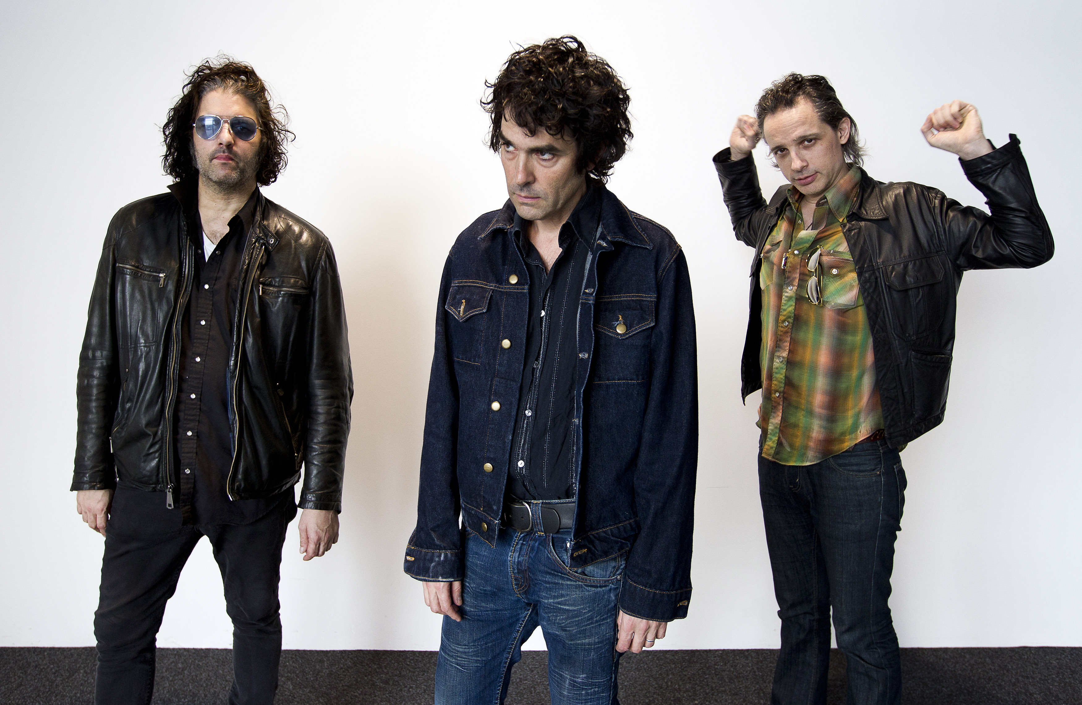 Jon Spencer Blues Explosion, studio portraits, Amsterdam, Netherlands, 13 August 2012. L-R Russell Simins, Jon Spencer and...