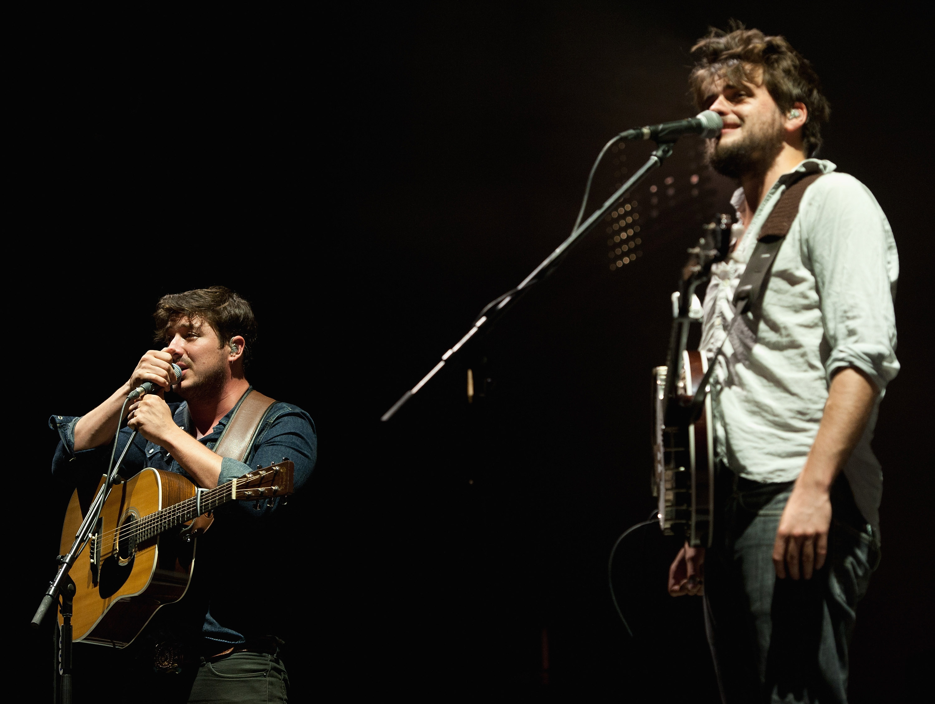KANSAS CITY, KS - SEPTEMBER 20:  Lead singer Marcus Mumford and banjo player Winston Marshall performing with Mumford & So...