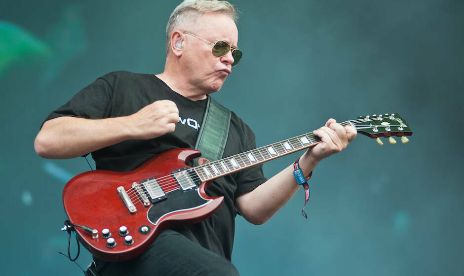 CHICAGO, IL - AUGUST 02:  Bernard Sumner of New Order performs during Lollapalooza 2013 at Grant Park on August 2, 2013 in Ch