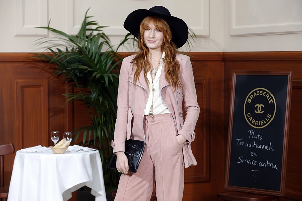 English singer Florence Welch poses before the Chanel 2015-2016 fall/winter ready-to-wear collection fashion show on March...